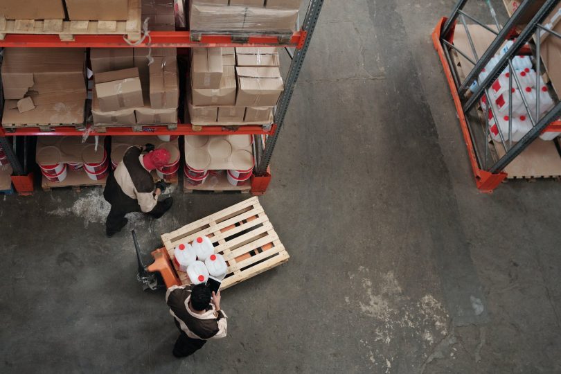men working in a warehouse